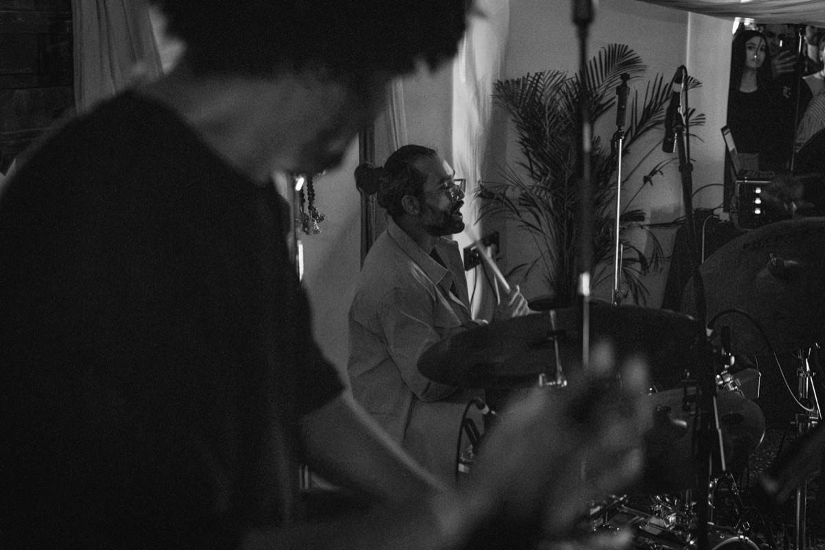 Percussion and drums mid-song, in black and white